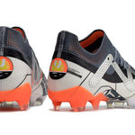 Chuteira Campo Puma Future Ultimate FG Branca, Prata e Laranja "Astronaut Pack"