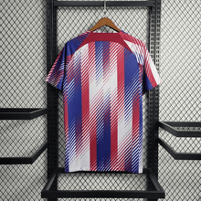 Camiseta de entrenamiento del Barcelona 2023/24 blanca, azul y roja
