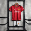 Kit local para niños del Manchester United 23/24