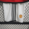 Kit local para niños del Manchester United 23/24