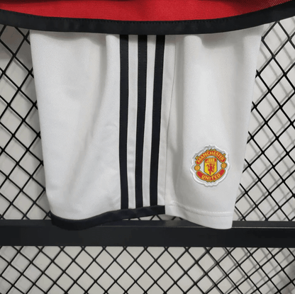 Kit local para niños del Manchester United 23/24