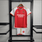 Kit local infantil del Arsenal 23/24