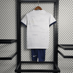 Kit local infantil del Tottenham 2023/24
