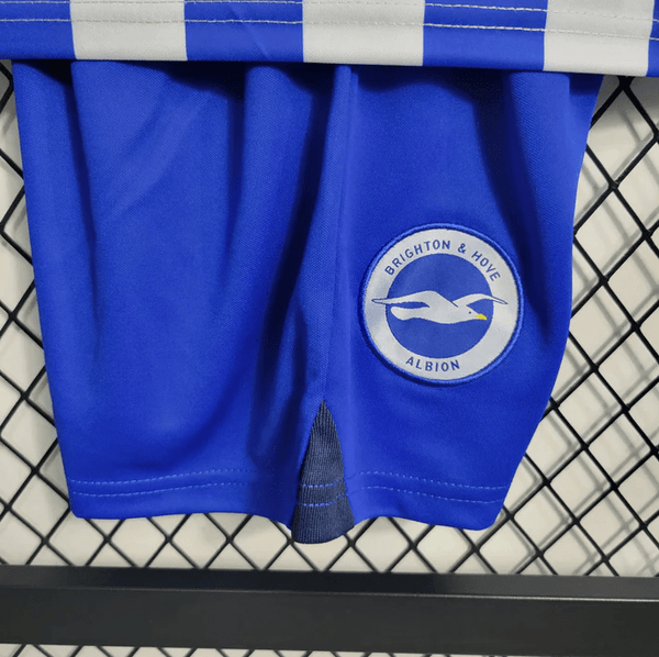 Kit local infantil del Brighton 2023/24