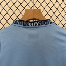 Kit local para niños del Manchester City 24/25