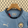 Kit local infantil del Manchester City 2024/25
