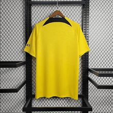 Camiseta amarilla de entrenamiento del PSG 2023/24