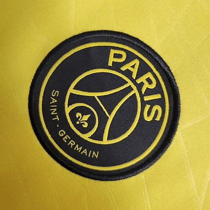 Camiseta amarilla de entrenamiento del PSG 2023/24