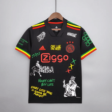 Camiseta local del Ajax “Bob Marley” 21/22