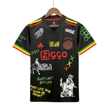 Camiseta local del Ajax “Bob Marley” 21/22