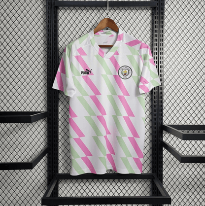 Camiseta de entrenamiento del Manchester City 2023/24 blanco y rosa
