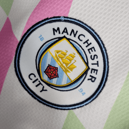 Camiseta de entrenamiento del Manchester City 2023/24 blanco y rosa