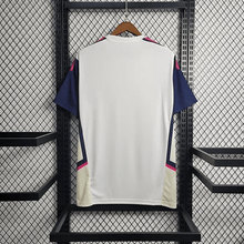 Camiseta de entrenamiento blanca y rosa del Arsenal 2023/24